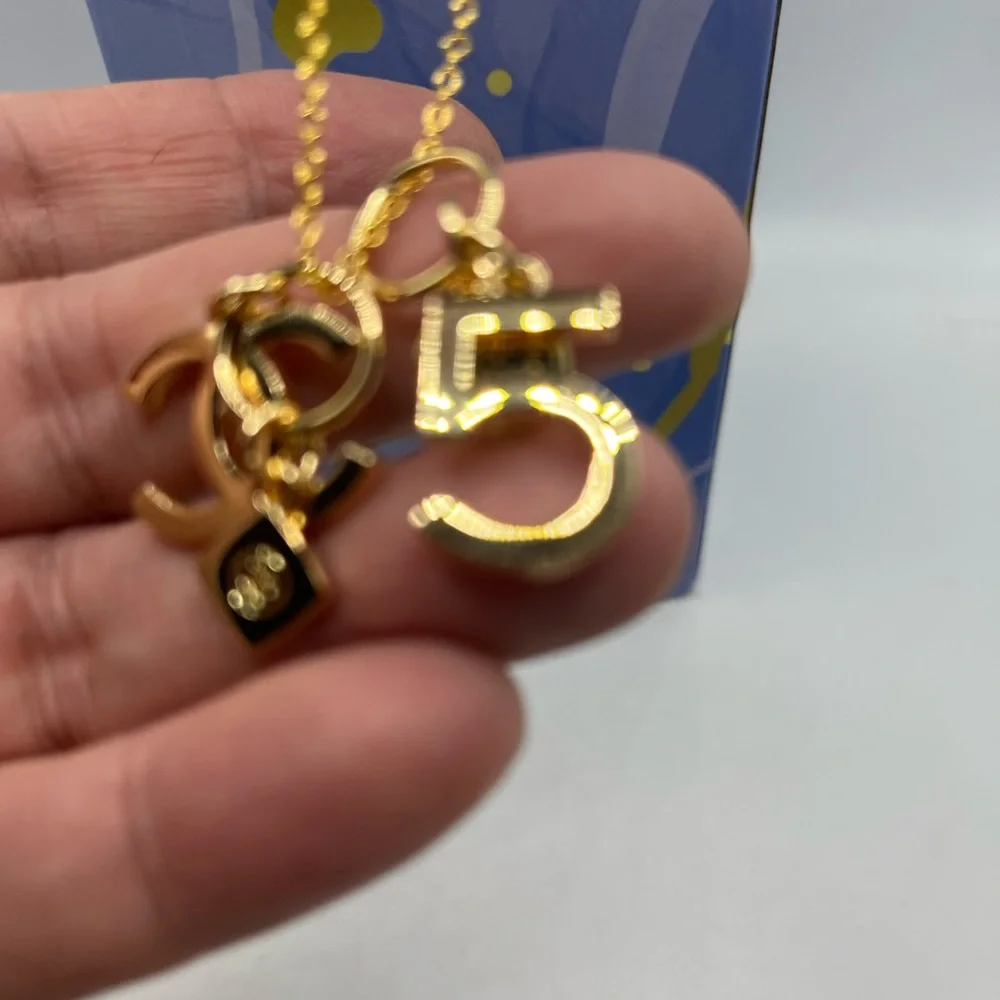 Chanel Necklace w/ Charms - New